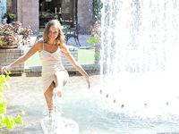 Riley plays in the fountain and naked in public