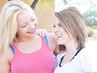 Nikkie and Aubrey outdoors kissing and eating pussy