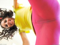 Trinity wearing pink tights and legwarmers but no panties