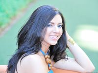 Madeline uses a dildo outside