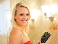 Whitney plays with her brush