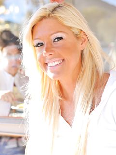 Tiffany shows off her shaved pussy