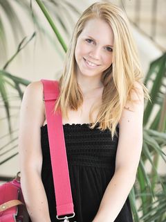 Courtney plays with her toys